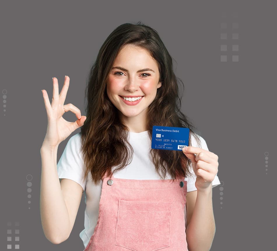 A customer collecting a personalized bank card from the kiosk